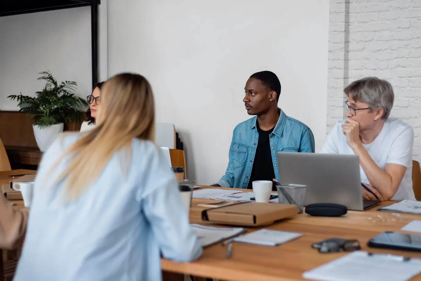 Medium shot of business people at a desk